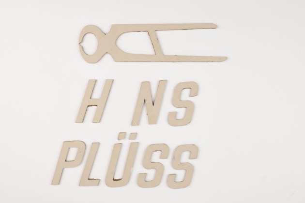 Ladenbeschriftung mit Logo der Eisenwarenhandlung von Hans Plüss («Zangen-Hans») in Frauenfeld