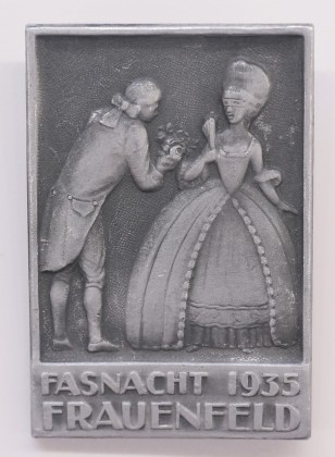 Abzeichen: Fasnachtsabzeichen (Fasnachtsplakette) auf die Fasnacht in Frauenfeld 1935, herausgegeben vom Verein Fasnachtsgesellschaft «Vogelzwitsch/Baldinzunft», geprägt in Neuenburg